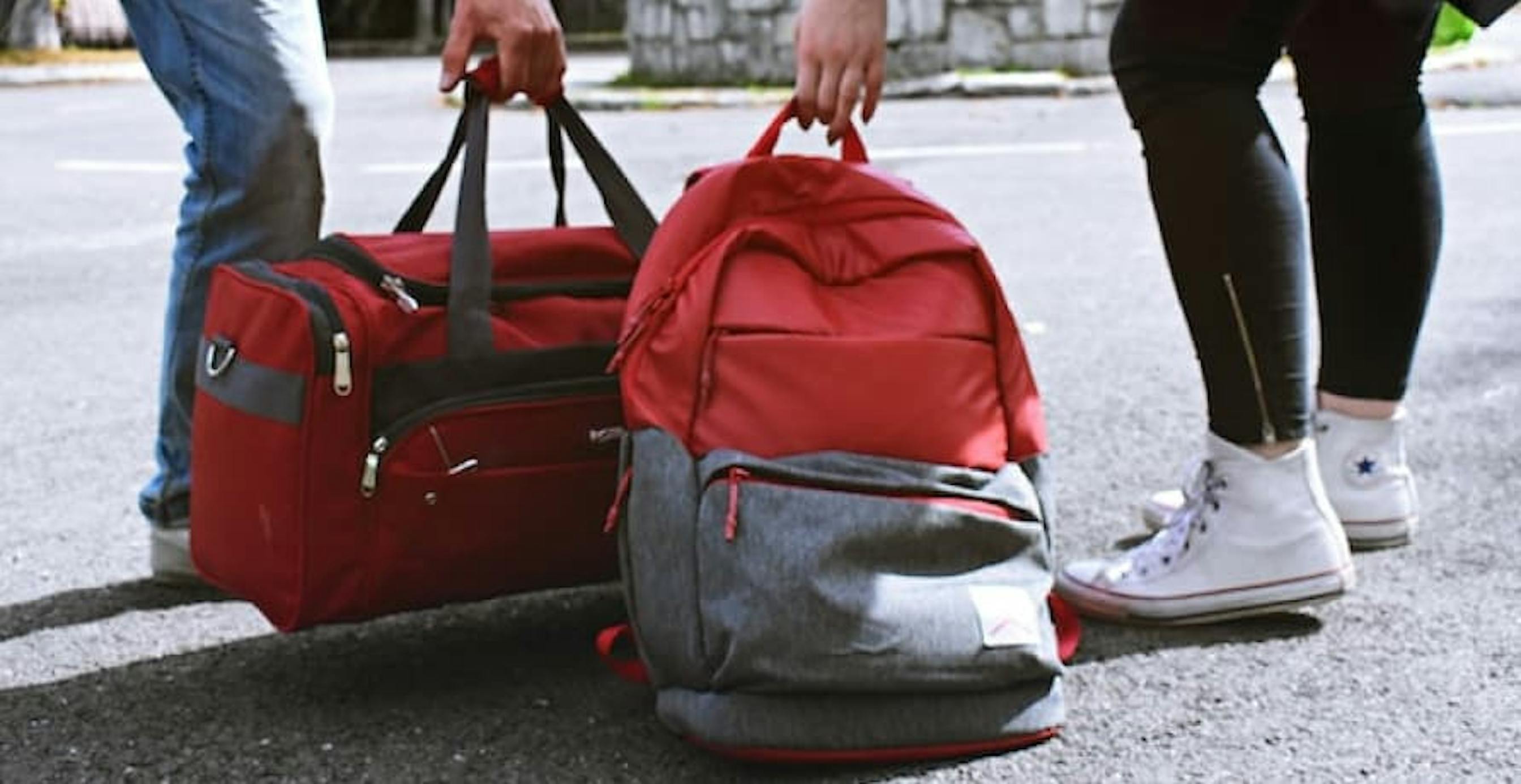 people with their luggage and backpacks