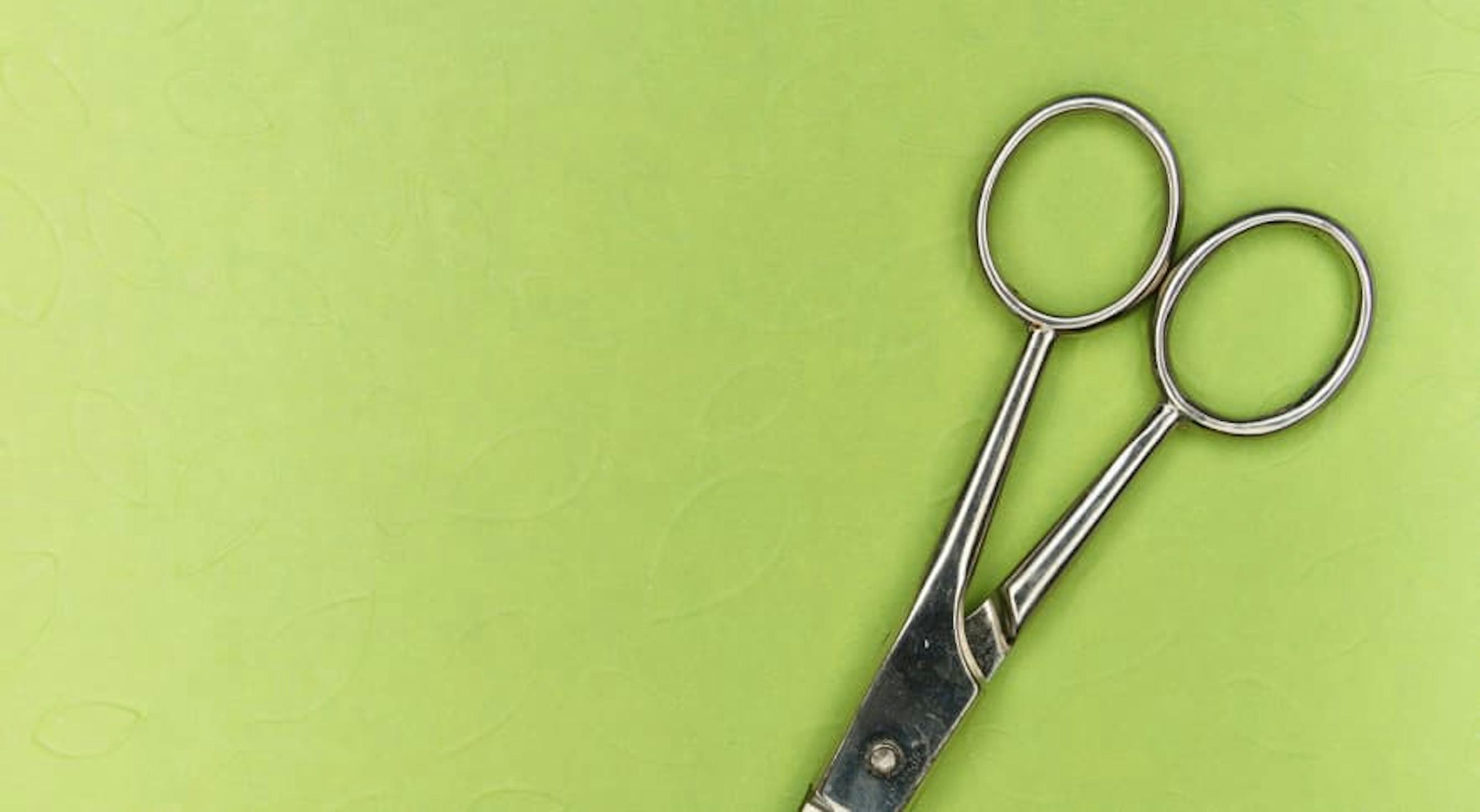 scissors with green background